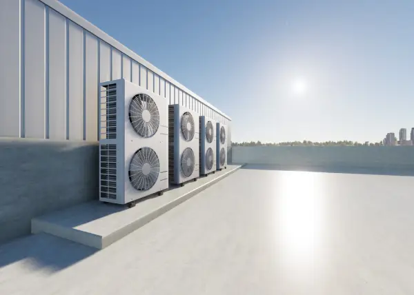 Air Conditioning Systems - Condenser and compressor air conditioning unit on the rooftop of an industrial plant