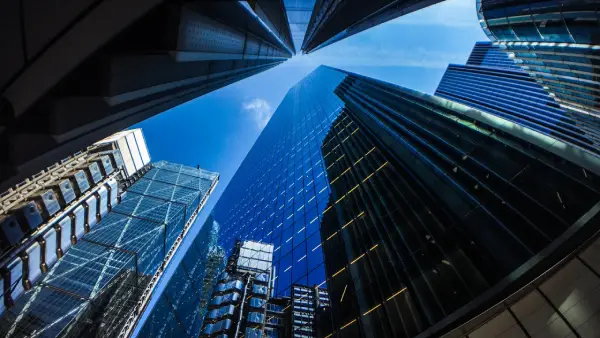 Commercial Facilities - Modern commercial office building with glass facade